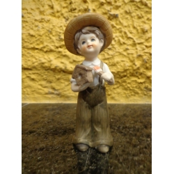 Bibelo Menino em Porcelana com Cuco